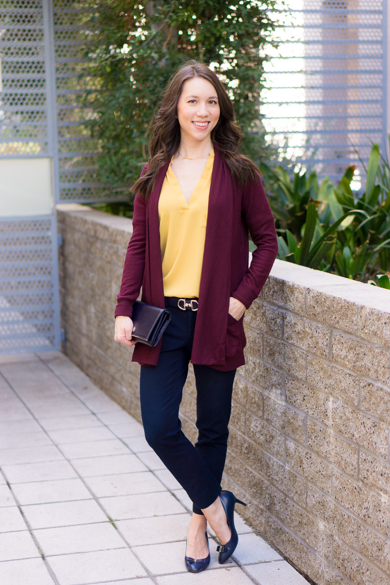 Stylish outfit inspiration with a burgundy sweater, pants, and